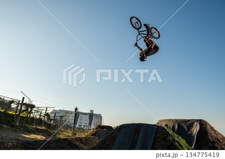 BMX Bike back flip jump 134775419
