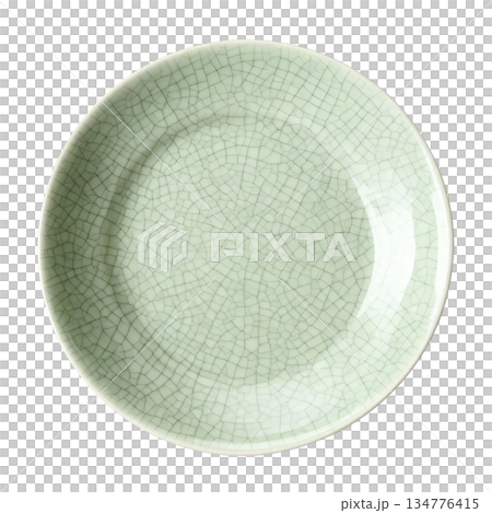 Elegant celadon plate with green crackle glaze. beautiful traditional ceramic piece from top view perspective Elegant celadon plate with green crackle glaze. beautiful traditional ceramic piece from top view perspective 134776415
