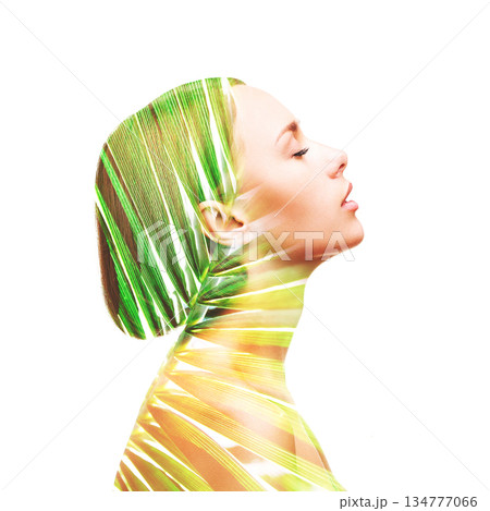 Profile beautiful woman and palm leaf 134777066