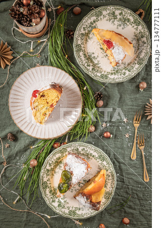 Slices of Bolo Rei or Kings Cake. Is a traditional Xmas cake made for Christmas, Carnavale or Mardi Gras Slices of Bolo Rei or Kings Cake. Is a traditional Xmas cake made for Christmas, Carnavale or Mardi Gras 134777111