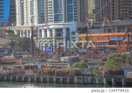 Oct 1 2025 Busy City Construction Site by Waterfront With Cranes and Modern Oct 1 2025 Busy City Construction Site by Waterfront With Cranes and Modern 134779410