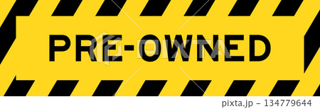 Yellow and black color with line striped label banner with word pre-owned Yellow and black color with line striped label banner with word pre-owned 134779644
