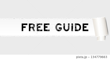 Ripped gray paper background that have word free guide under torn part 134779663