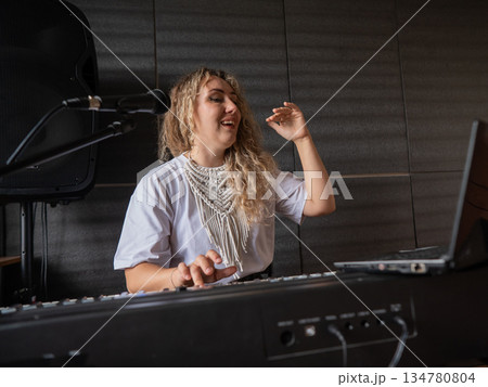 Caucasian woman teaches online music lesson..  134780804