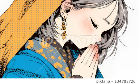 手を合わせてお祈りをしている和服姿の若い女性