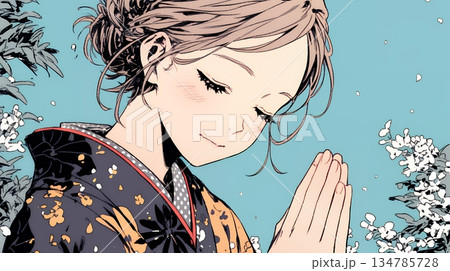 手を合わせてお祈りをしている和服姿の若い女性