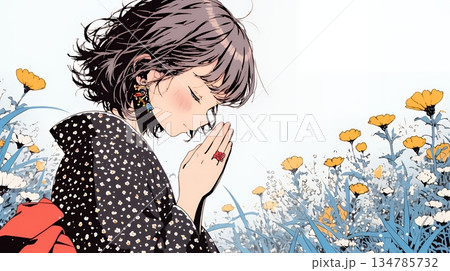 手を合わせてお祈りをしている和服姿の若い女性