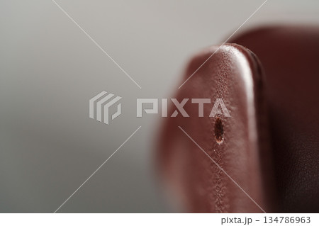 Closeup detail shot of brown leather sneaker 134786963