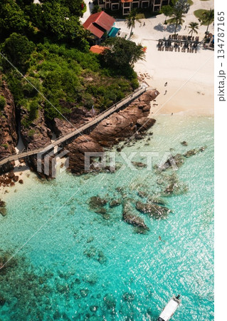 Top view of Long beach with clear turquoise waters and tourists on Redang Island. Malaysia Top view of Long beach with clear turquoise waters and tourists on Redang Island. Malaysia 134787165