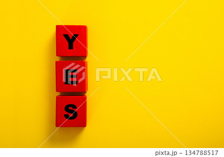 Yes word spelled by red wooden blocks 134788517