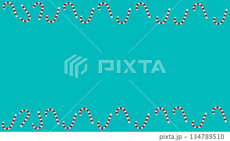 Playful wavy border of candy cane stripes on a blue background, ideal for holiday-themed frames or seasonal invitations. Playful wavy border of candy cane stripes on a blue background, ideal for holiday-themed frames or seasonal invitations. 134789510