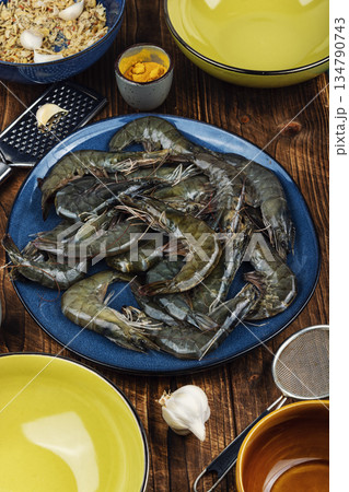 Seafood on a plate, pile of raw langoustines. Seafood on a plate, pile of raw langoustines. 134790743