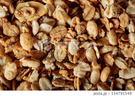 Crunchy Granola with Oats Raisins and Cereal Flakes Close-Up Crunchy Granola with Oats Raisins and Cereal Flakes Close-Up 134791549