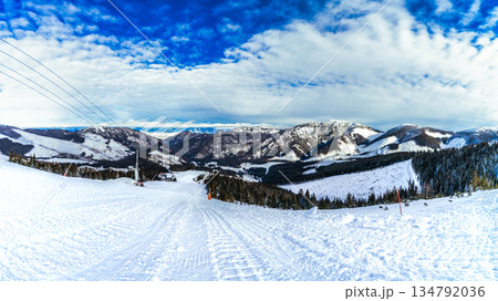 High Angle Winter Panorama of Ski Resort and Mountain Ridges 134792036