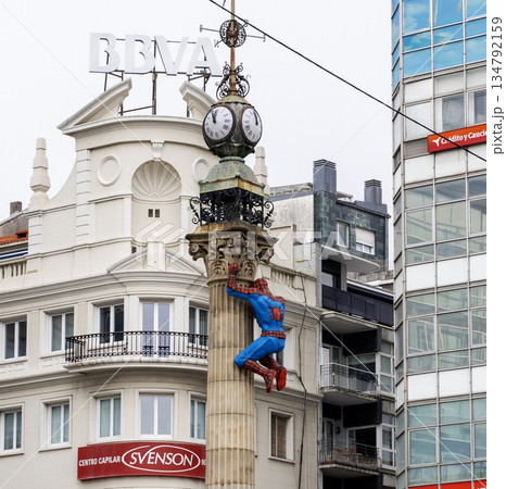 Spiderman Figure Climbs a Clock Tower in La Coruna, Spain Spiderman Figure Climbs a Clock Tower in La Coruna, Spain 134792159
