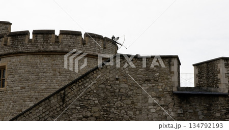 Archer on Castle Wall Prepares for Target Practice at Historic Site 134792193
