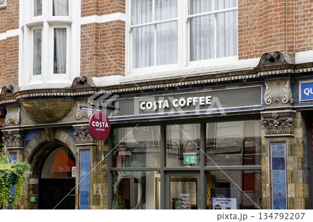 Costa Coffee Shop Exterior With Sign and Decorative Design on Building 134792207