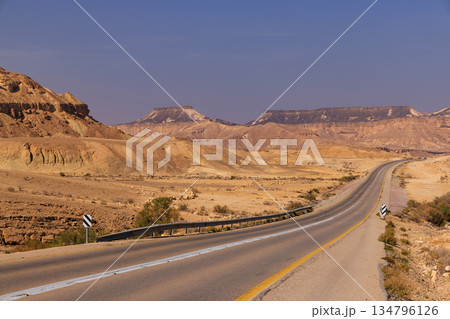 Scenic Desert Road in Israel Under Blue Sky 134796126