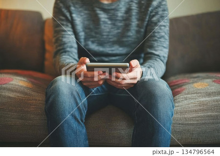 Doctor Comforting Patient While Holding Tablet in a Calm and Caring Environment Doctor Comforting Patient While Holding Tablet in a Calm and Caring Environment 134796564