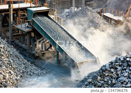 Dynamic Steel Vibrating Screen in Action at Industrial Sorting Facility for Mining Materials Dynamic Steel Vibrating Screen in Action at Industrial Sorting Facility for Mining Materials 134796876