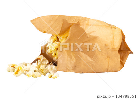 Popcorn in a brown paper bag isolated on white background Popcorn in a brown paper bag isolated on white background 134798351