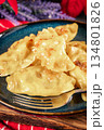 Dumplings with potato and cheese filling. 134801826