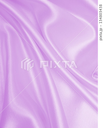 Smooth elegant lilac silk or satin texture as wedding background. Luxurious background design 134803438