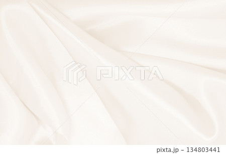 Smooth elegant golden silk or satin luxury cloth texture as wedding background. Luxurious background design. In Sepia toned. Retro style 134803441