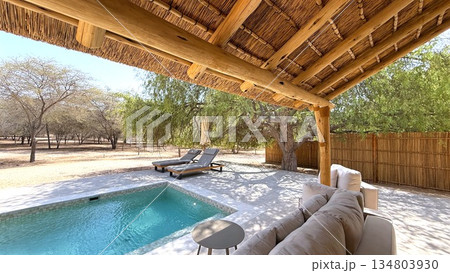 Luxury Outdoor Sanctuary, Refined Patio With Sweeping Views Of Natural Landscape And Waterways, Sophisticated Openair Lounge Offering Tranquil Vistas Of Distant Nature Preserves And Flowing Waters 134803930