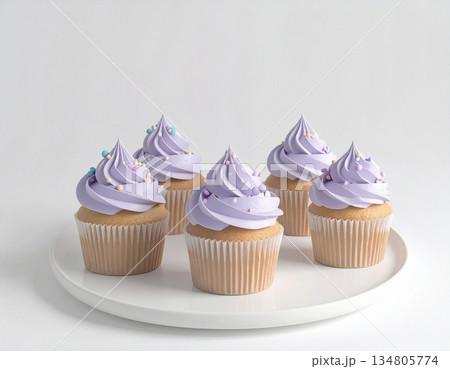 Elegance food marketing. Various cupcakes in pastel colors on dessert stand with soft lighting. Elegance food marketing. Various cupcakes in pastel colors on dessert stand with soft lighting. 134805774