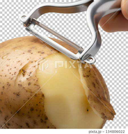 Close-up hand peeling a raw potato with a metal peeler, isolated on transparent background. Image for cooking, meal prep, and food blog content 134806022