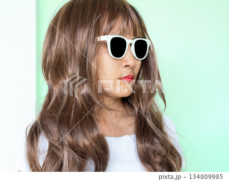 Woman Sunglasses Brown Hair Lifestyle Travel Summer Tropical, Young People Face Skin Tan Model on Blue Wall with Overlay Sun, Portrait Girl Pretty Posing, Eye patch Pterygium Surgery Eye Medical Woman Sunglasses Brown Hair Lifestyle Travel Summer Tropical, Young People Face Skin Tan Model on Blue Wall with Overlay Sun, Portrait Girl Pretty Posing, Eye patch Pterygium Surgery Eye Medical 134809985