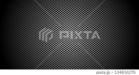 Dark Carbon Fiber Pattern Background with Spotlight Vignette. Dark Carbon Fiber Pattern Background with Spotlight Vignette. 134810270