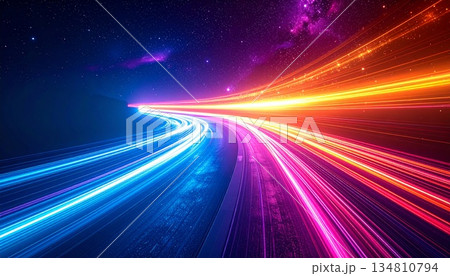A stunning long-exposure photograph of a multi-lane highway at night, capturing vibrant, high-speed light trails in striking blue, magenta, and red neon colors. The dynamic streaks, future technology 134810794