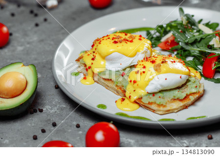 Sandwiches with avocado and poached egg, healthy breakfast. Sandwiches with avocado and poached egg, healthy breakfast. 134813090