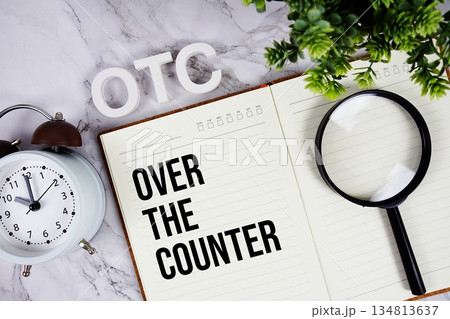 OTC - Over The Counter acronym on notepad, Business concept background 134813637
