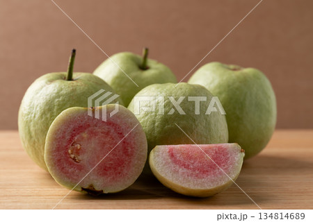 Sliced guava on wooden background, Tropical fruit high vitamin C 134814689