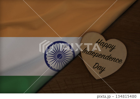Indian flag on wooden surface with Happy Independence Day on wooden heart Indian flag on wooden surface with Happy Independence Day on wooden heart 134815480