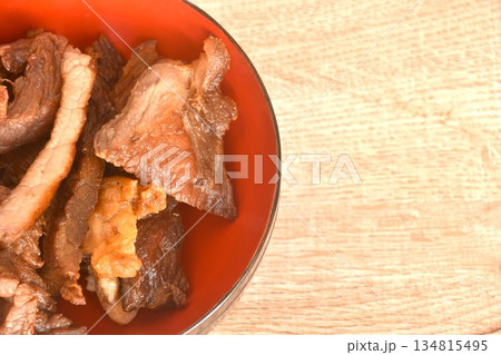 fried crispy salty fermenting beef fat meat with pepper on bowl fried crispy salty fermenting beef fat meat with pepper on bowl 134815495
