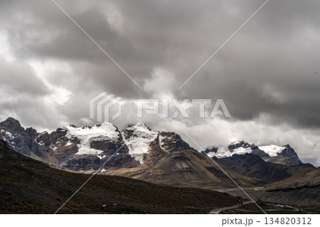 Stone trail leading to Pastoruri Glacier, Huaraz, Peru, amidst rugged mountains Stone trail leading to Pastoruri Glacier, Huaraz, Peru, amidst rugged mountains 134820312
