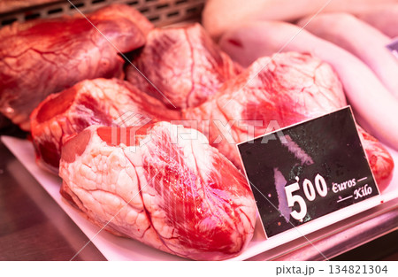Raw beef heart on store counter Raw beef heart on store counter 134821304