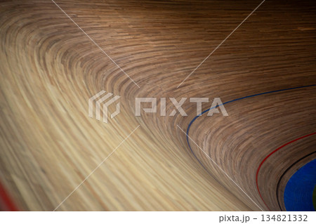 Very sharp turn with special wood surface. Taking turn on cycling track. Dangerous banked turn for maximum speed. Cycling competition. Closed circuit for bicycles with sharp turn Very sharp turn with special wood surface. Taking turn on cycling track. Dangerous banked turn for maximum speed. Cycling competition. Closed circuit for bicycles with sharp turn 134821332