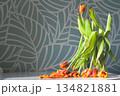 Withered flowers. Dry tulips in the sun. Fallen flowers. Bouquet of flowers. 134821881