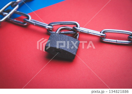 Flag of Russia and a chain with a lock. Country blocking. Prohibited. Flag of Russia and a chain with a lock. Country blocking. Prohibited. 134821886