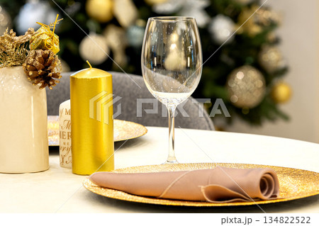 Elegant table decoration for a christmas dinner Elegant table decoration for a christmas dinner 134822522