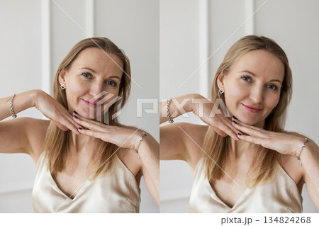 Beautiful natural woman posing with hands under chin in minimalist studio Beautiful natural woman posing with hands under chin in minimalist studio 134824268
