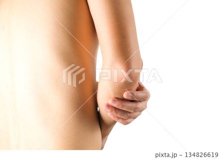 Men use their hands to hold their elbows and He had pain at the elbows.. Painful Health and medical concepts Men use their hands to hold their elbows and He had pain at the elbows.. Painful Health and medical concepts 134826619