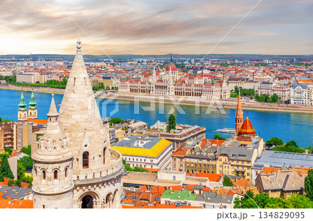 Sunset aerial view from above on Parliament building and the Danube river, Budapest, Hungary . Sunset aerial view from above on Parliament building and the Danube river, Budapest, Hungary . 134829095