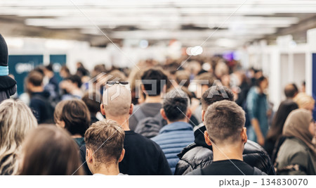 Abstract blurred people at exhibition hall of expo event trade show. Business convention show or job fair. Business concept background. 134830070