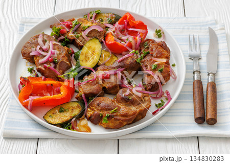 Grilled pork neck chunks with roasted veggies Grilled pork neck chunks with roasted veggies 134830283